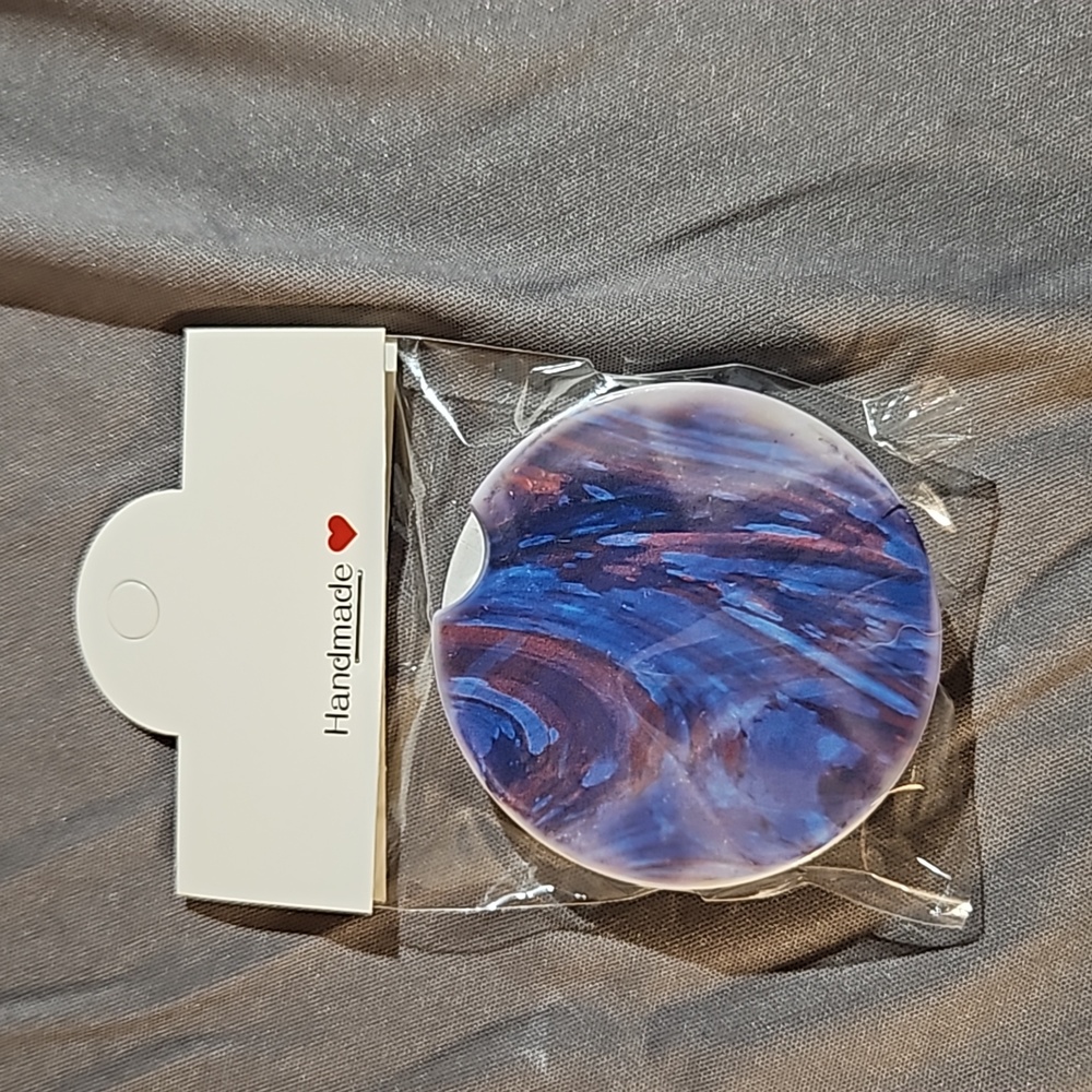 17. Set of Ceramic Car Coasters